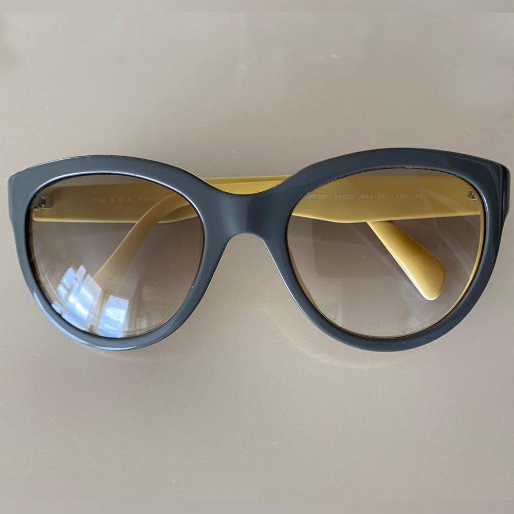 Women’s Prada gray and yellow light tint sunglasses